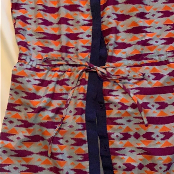 This is a patterned, collared button down dress - Picture 2 of 5